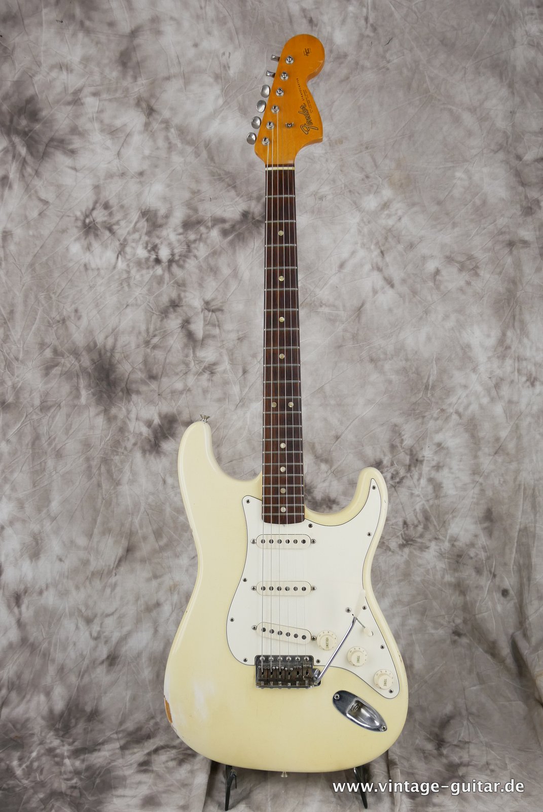 Fender_Stratocaster_olympic_white_refinish_1966-001.JPG
