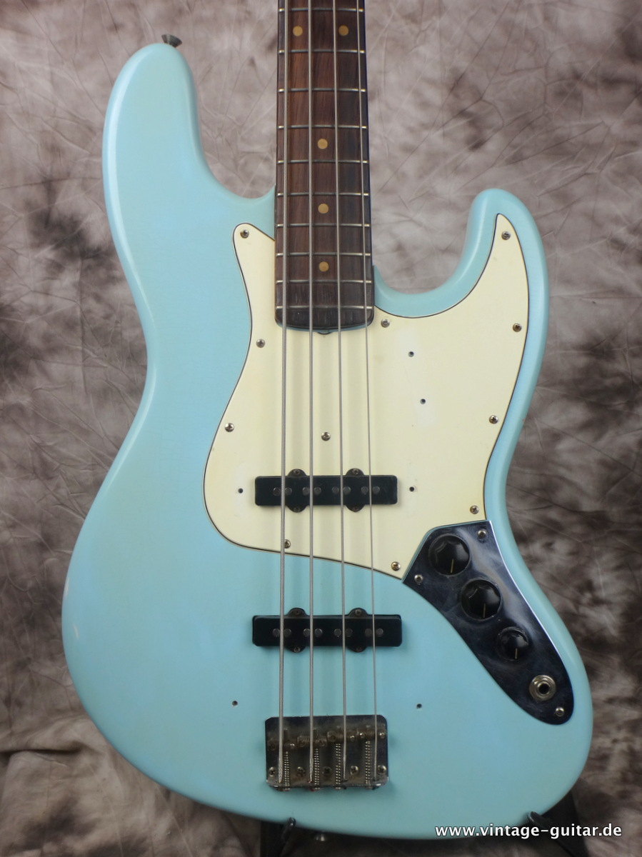 Fender_Jazz-Bass-matching-headstock-sonic-blue-1964-case-brown-refinished-002.JPG