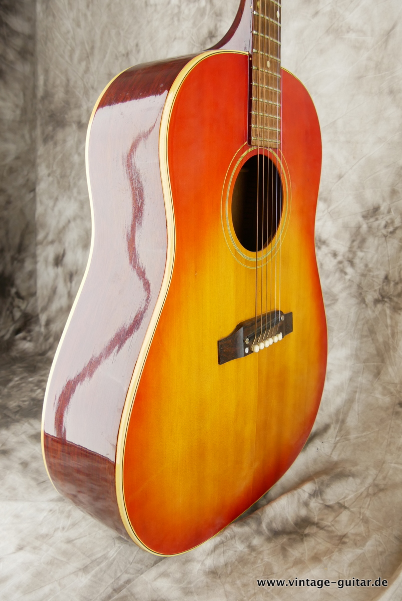 img/vintage/3678/Gibson_J_45_ADJ_Bridge_cherry_sunburst_1964-005.JPG