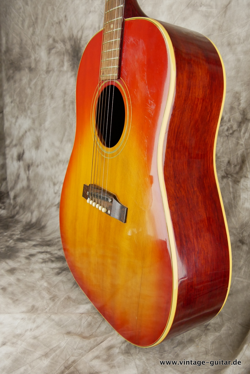 img/vintage/3678/Gibson_J_45_ADJ_Bridge_cherry_sunburst_1964-006.JPG