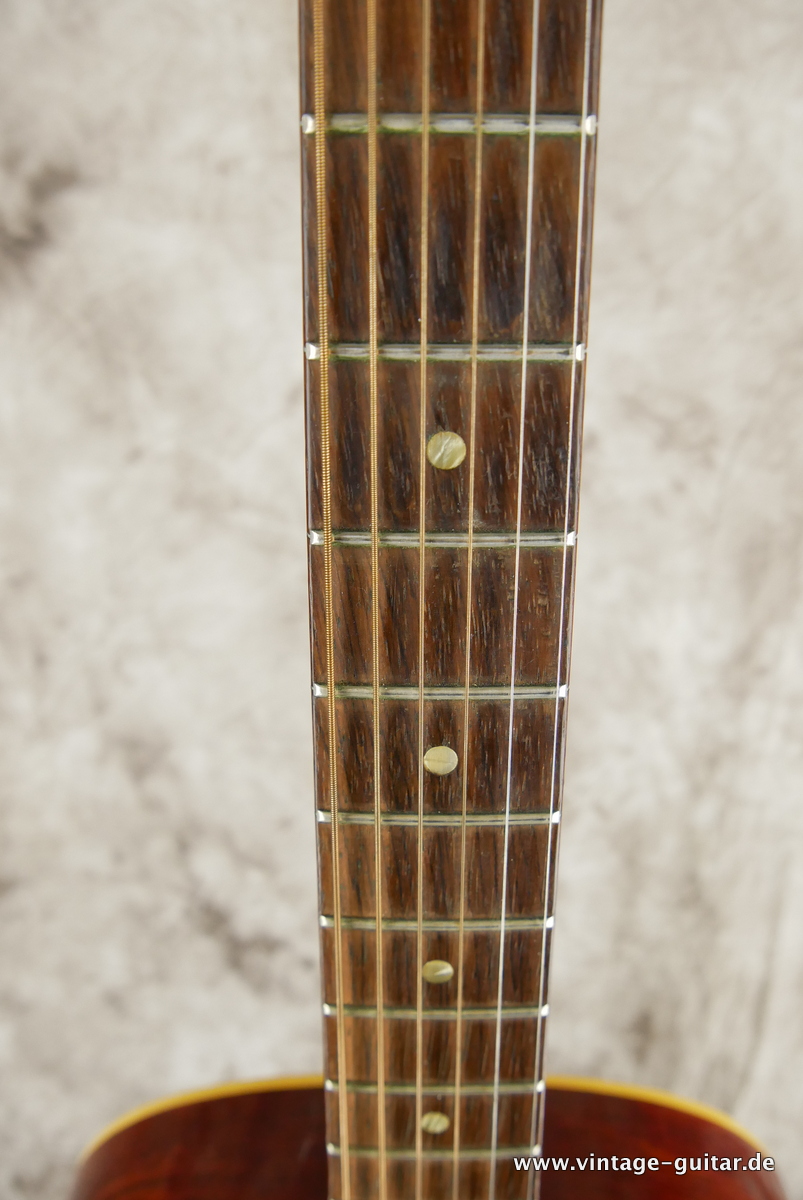 img/vintage/3678/Gibson_J_45_ADJ_Bridge_cherry_sunburst_1964-011.JPG