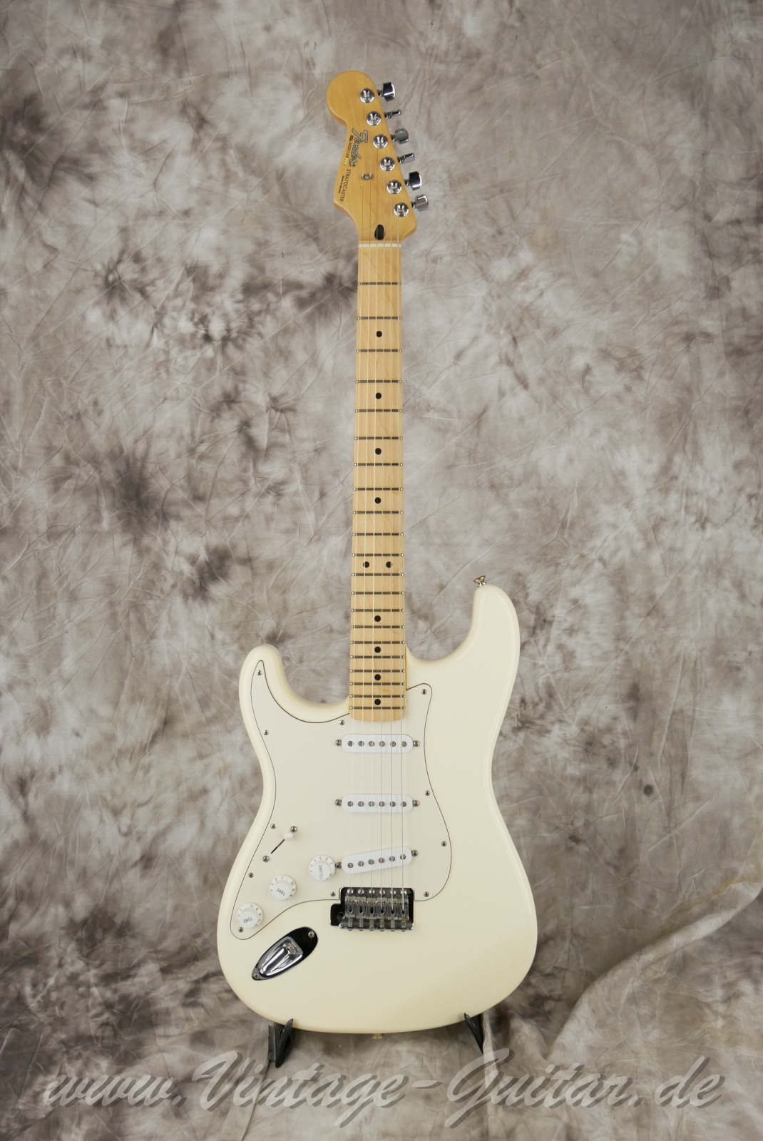 Fender-Stratocaster-lefthand-maple-neck-mexico-2006-arctic-white-01.jpg
