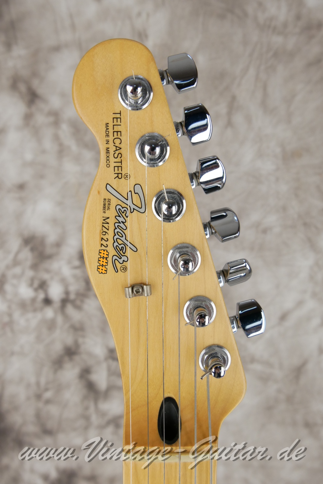 img/vintage/6111/Fender_Telecaster_lefthand_chrom_red_Mexico_2006-003.JPG