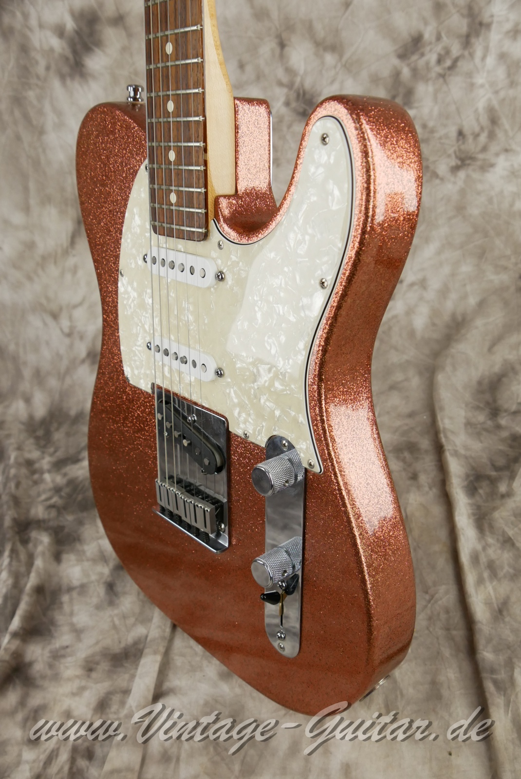 img/vintage/6200/Fender_Telecaster_American_Classic_Custom_Shop_champagne_metal_flake_1995-010.JPG