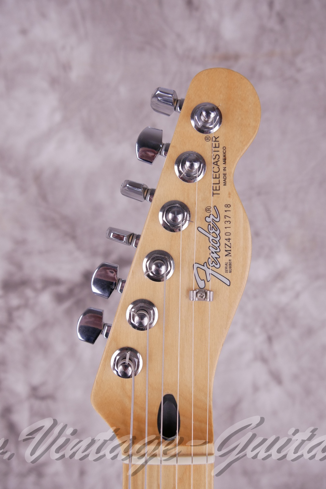 img/vintage/6357/fender_telecaster_mim_sunburst_mexico_2004-03.jpg