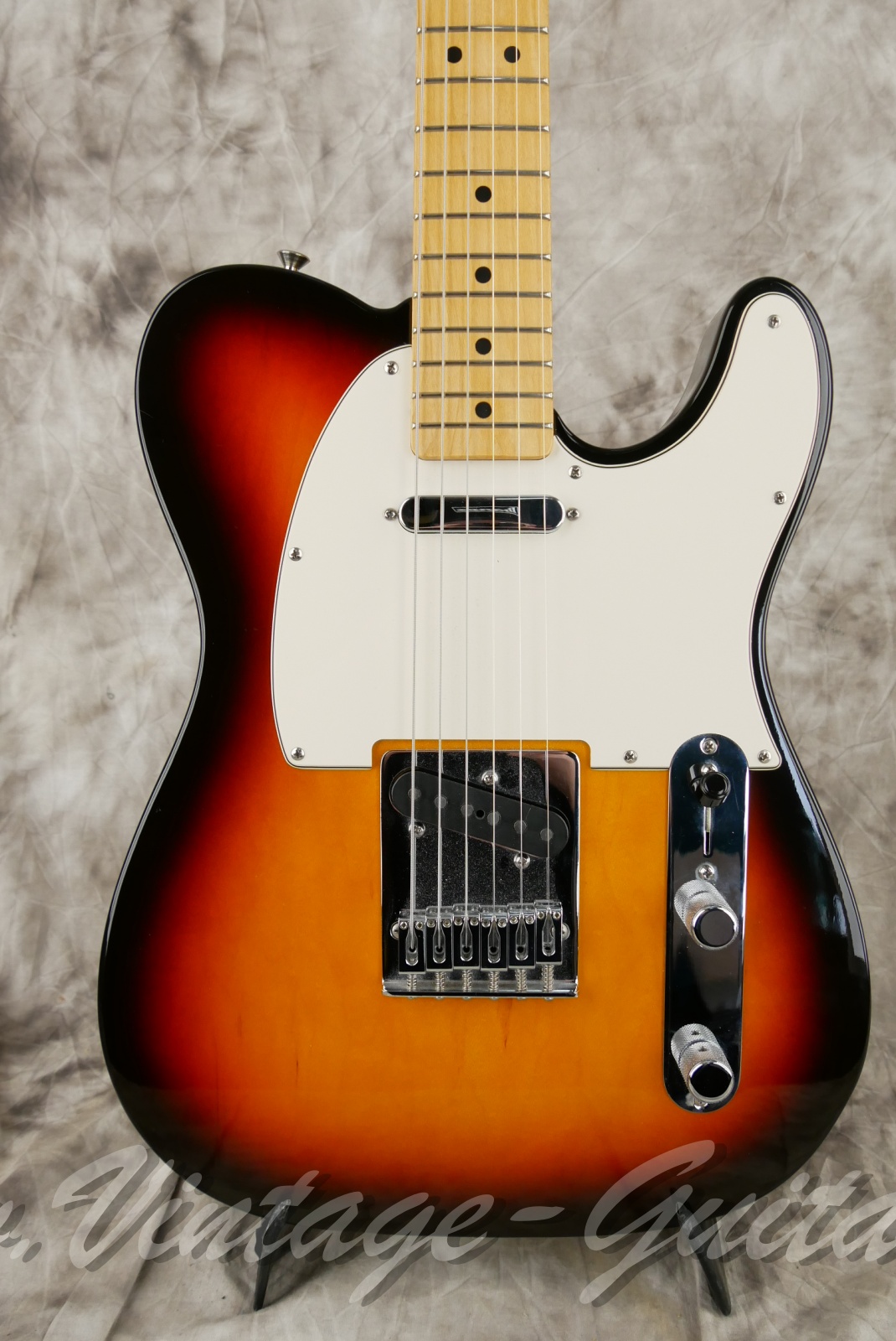 img/vintage/6357/fender_telecaster_mim_sunburst_mexico_2004-07.jpg