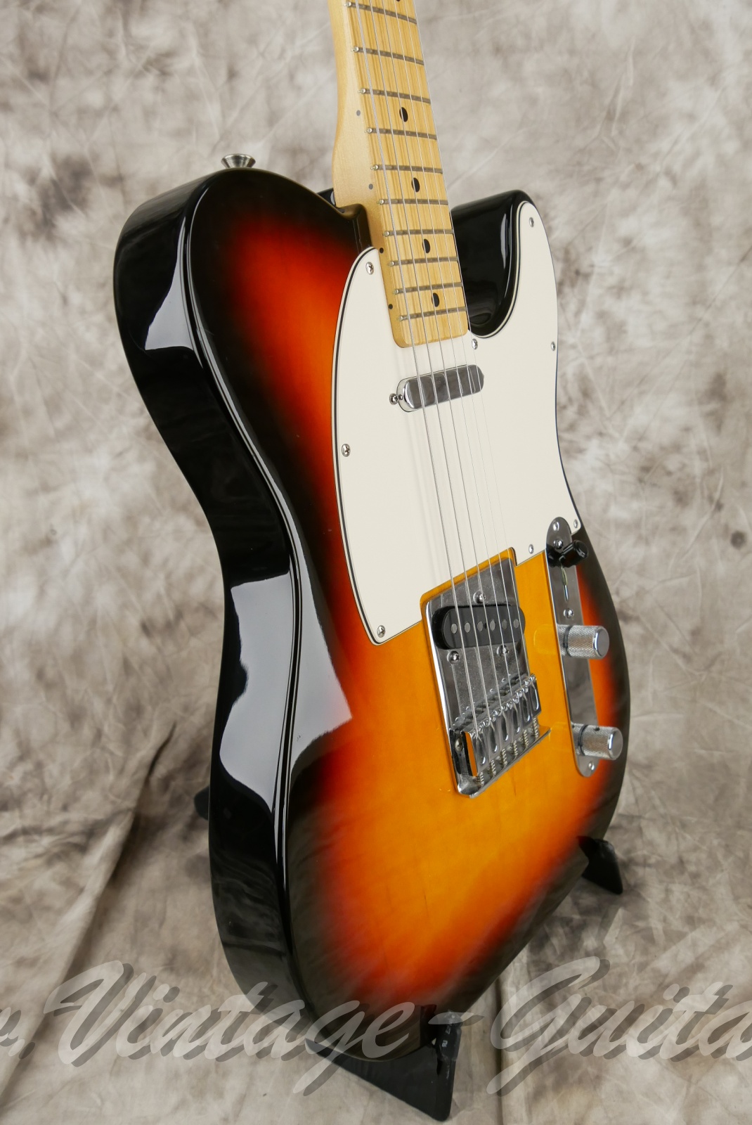 img/vintage/6357/fender_telecaster_mim_sunburst_mexico_2004-09.jpg