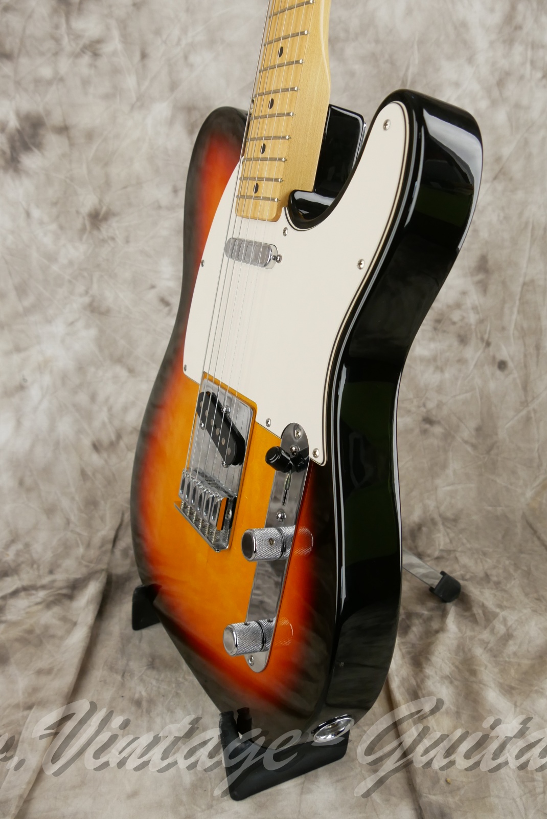 img/vintage/6357/fender_telecaster_mim_sunburst_mexico_2004-10.jpg
